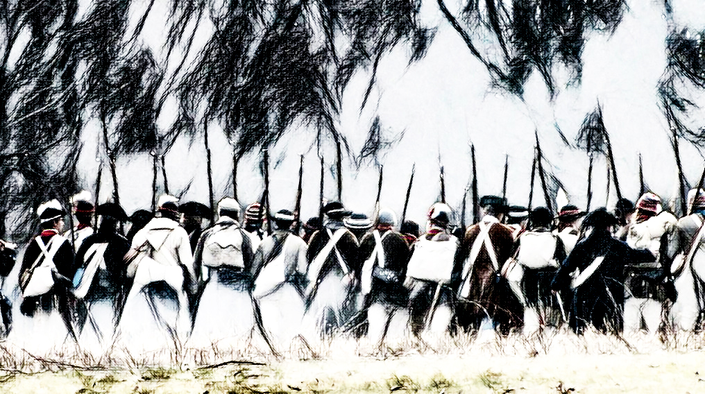 re-enactors marching through the battlefield